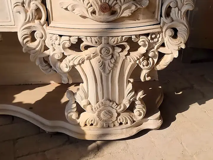 A round bed headboard, fully carved, before polish